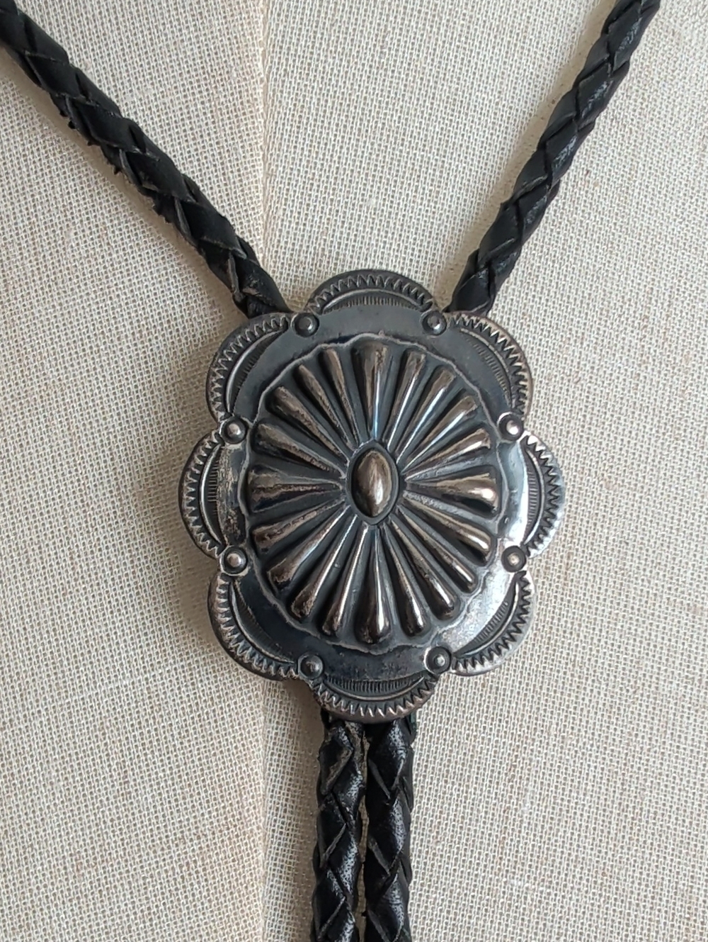Vintage Black Braided Leather Bolo Tie with Silver Concho